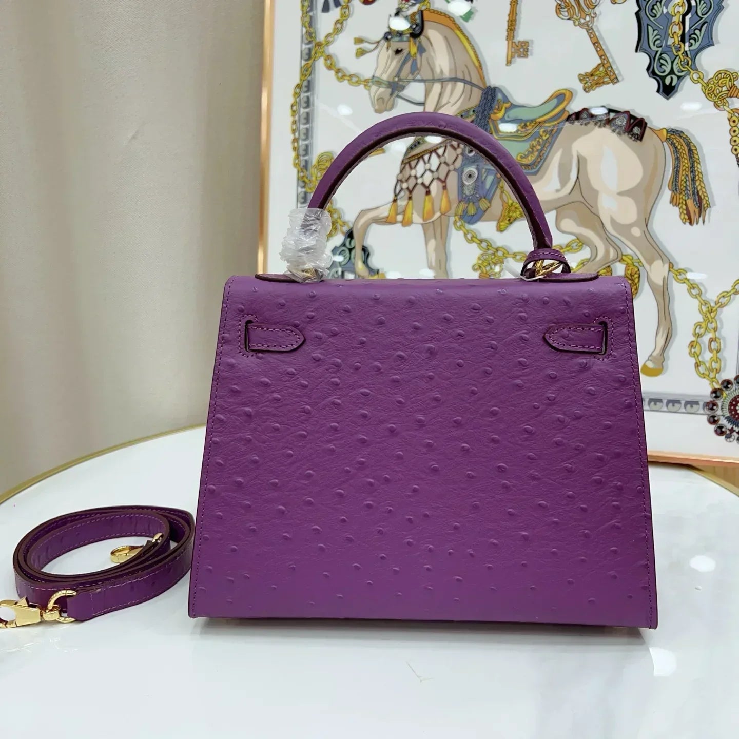 Kelly II Mini Purple-Red Ostrich Leather with Gold Hardware