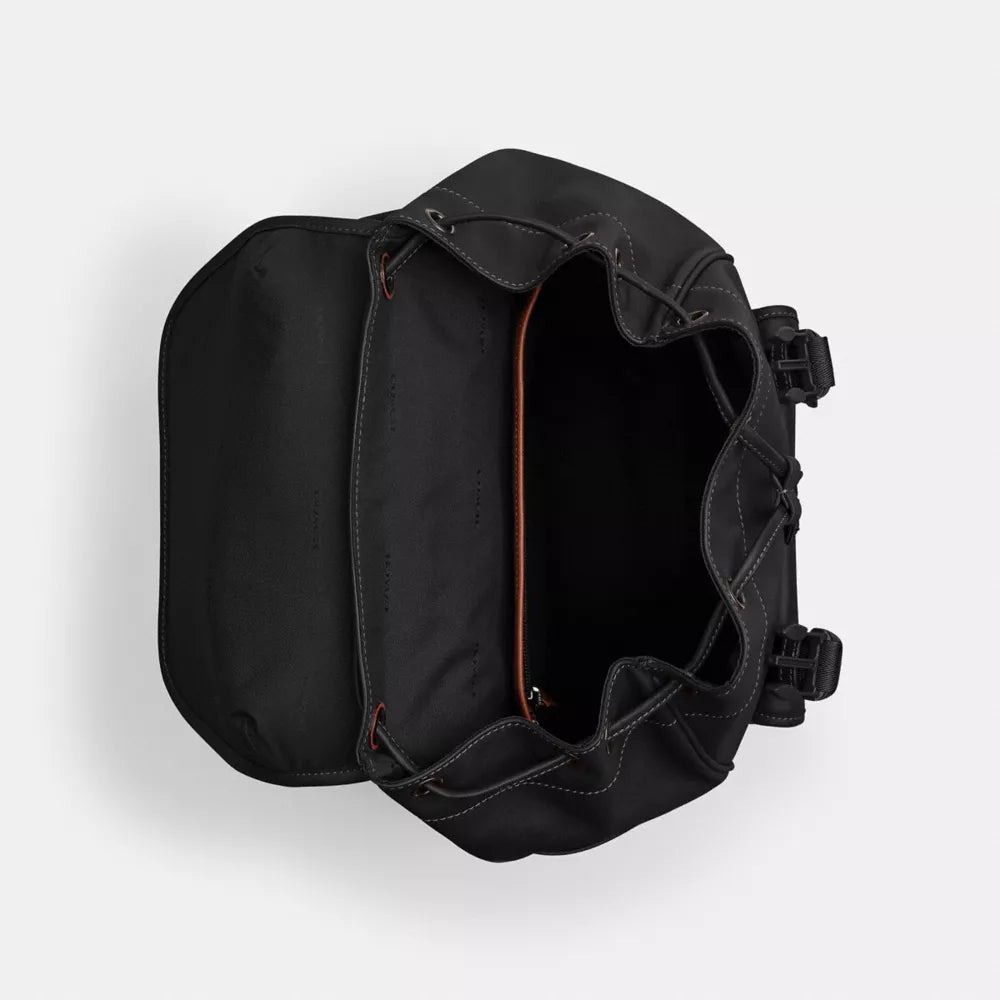 Sleek Leather Flap Backpack with Multi-Compartment Design