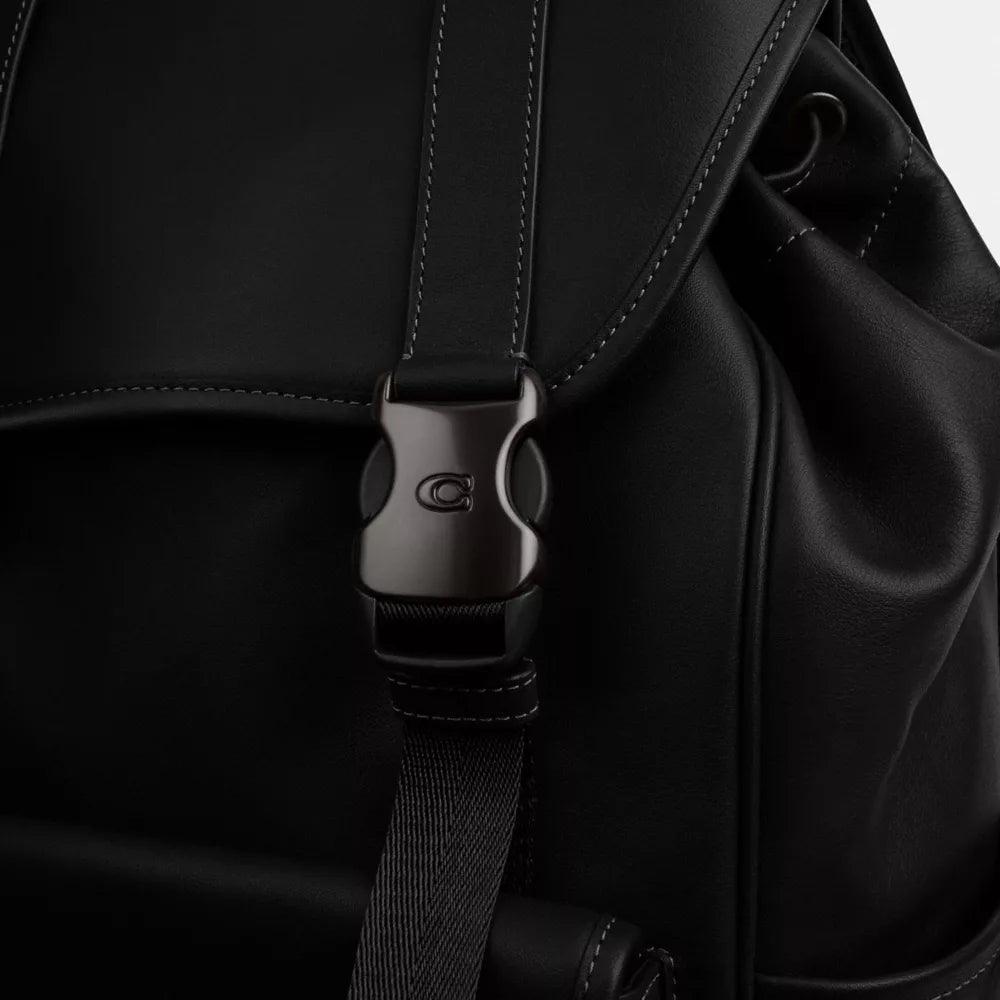 Sleek Leather Flap Backpack with Multi-Compartment Design