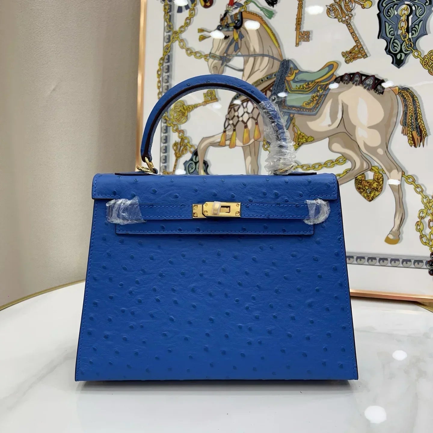 Kelly 25 Sellier Ostrich Bleuet Gold Hardware