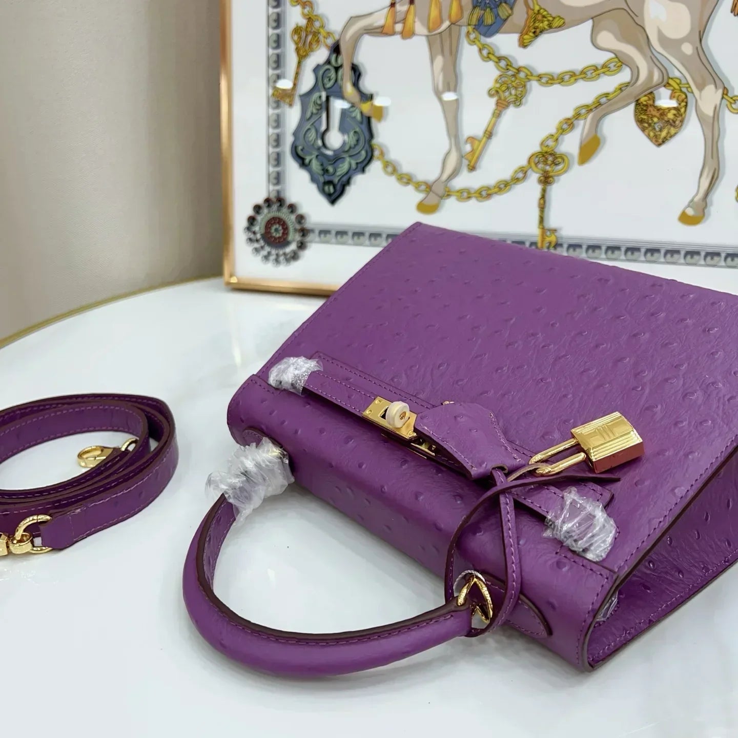 Kelly II Mini Purple-Red Ostrich Leather with Gold Hardware