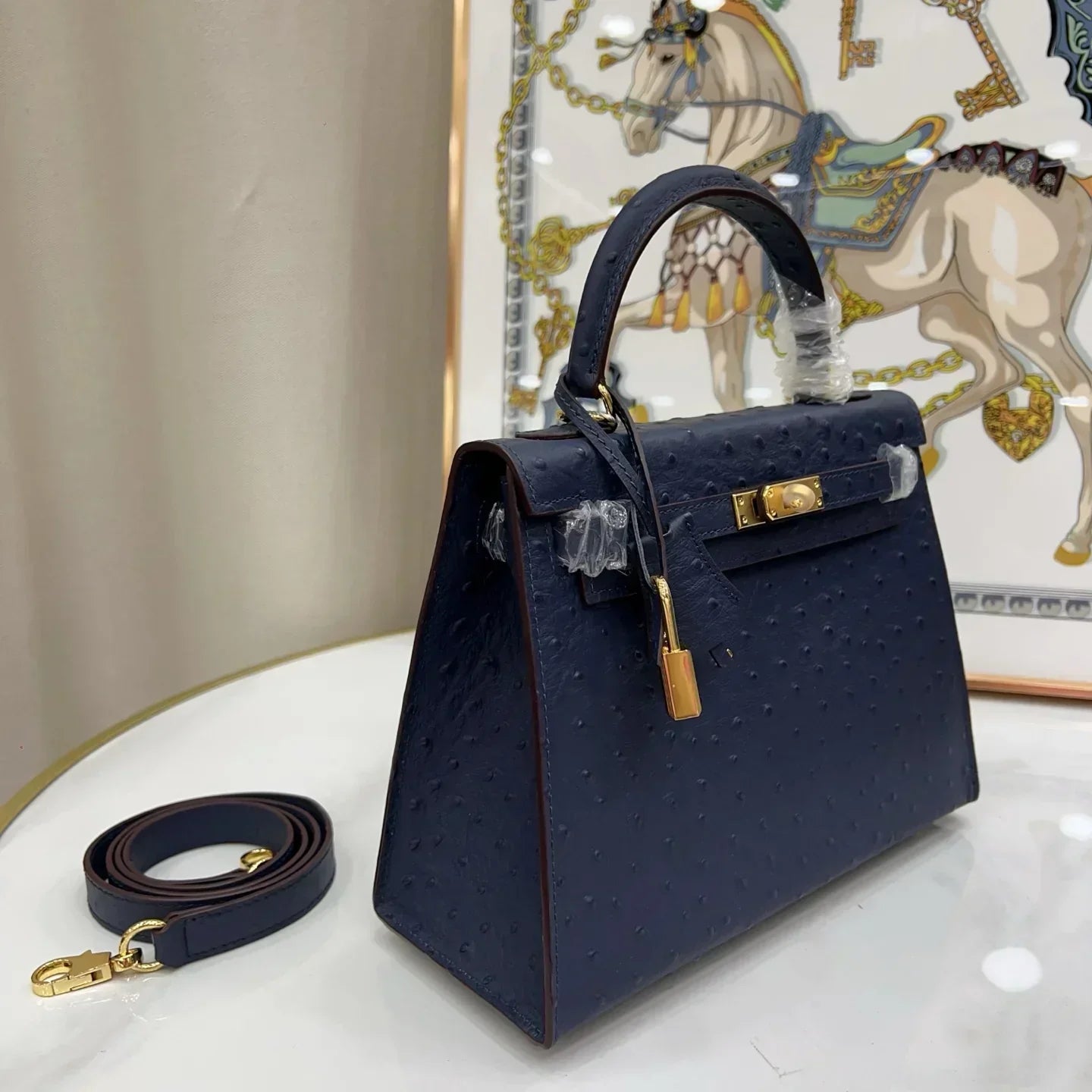 Kelly 25 Bleu Iris Sellier Ostrich Gold Hardware