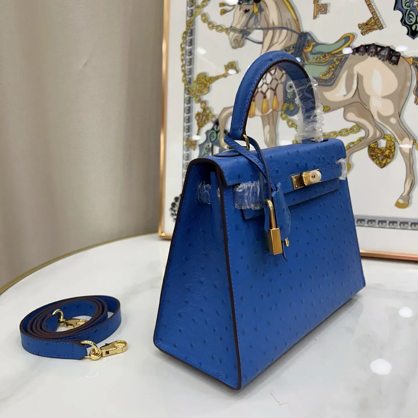 Kelly 25 Sellier Ostrich Bleuet Gold Hardware