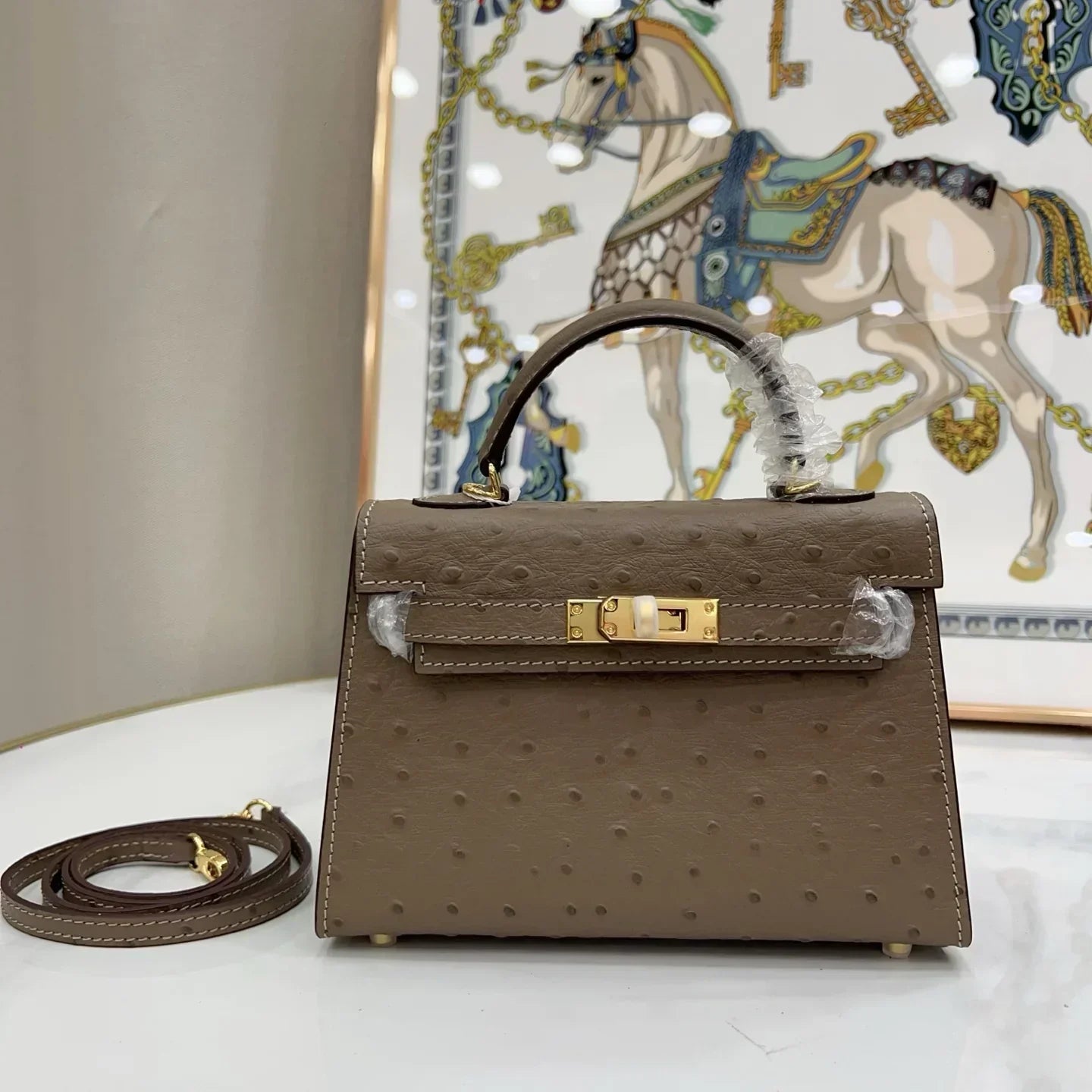 Kelly II Mini Gris Tourterelle Ostrich Gold Hardware