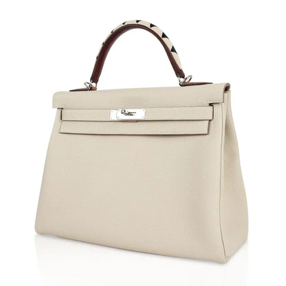 Limited Edition Kelly 32 Retourne Bag Au Galop Craie Togo Leather with Palladium Hardware