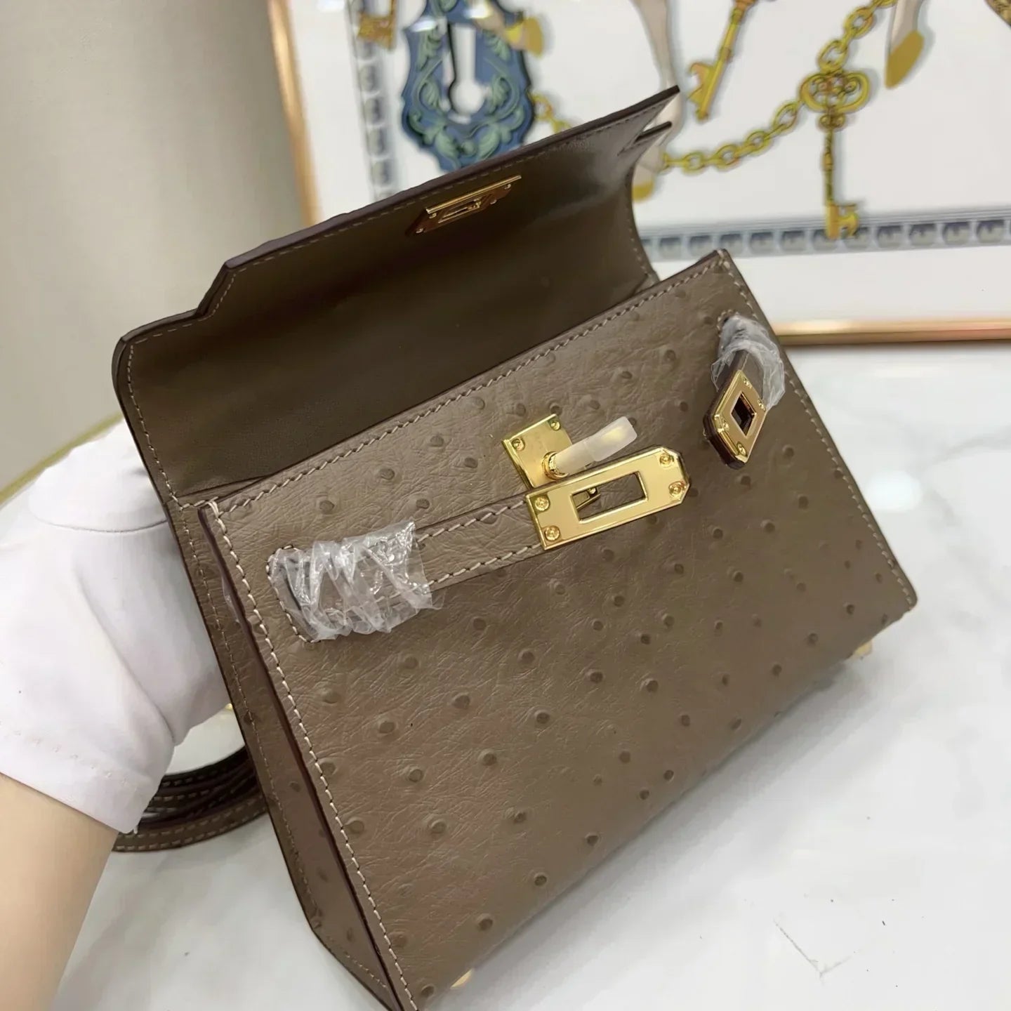 Kelly II Mini Gris Tourterelle Ostrich Gold Hardware