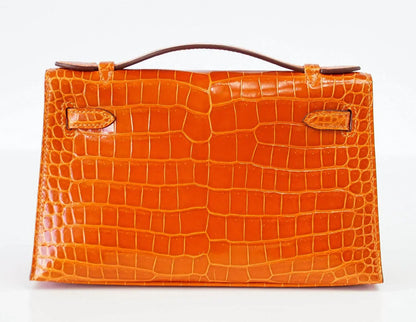 Kelly Pochette Clutch Bag Orange Feu Rare in Porosus Crocodile