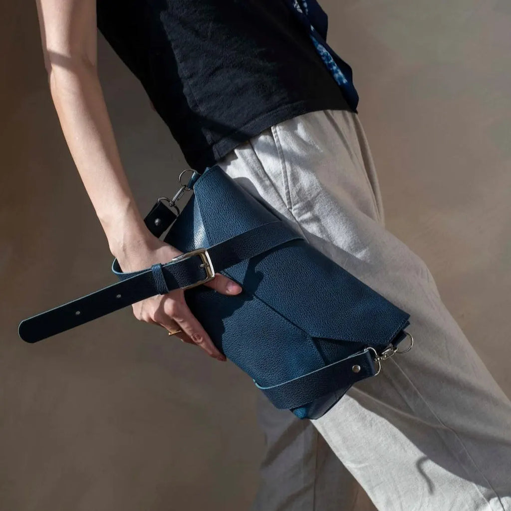 Two-Tone Origami Fold Envelope Shoulder Bag With Textured Grain Surface, Silvery Buckle Strap Hardware And Clean Geometric Front Paneling