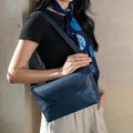 Two-Tone Origami Fold Envelope Shoulder Bag With Textured Grain Surface, Silvery Buckle Strap Hardware And Clean Geometric Front Paneling